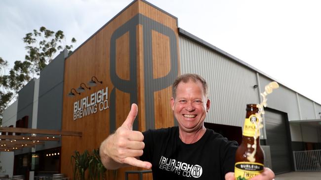 Head brewer Brennan Fielding of Burleigh Brewing which won gold medal in the World Beer Championship for their Tropical Pale Ale celebrates, Burleigh Heads, Gold Coast. Photo: Regi Varghese