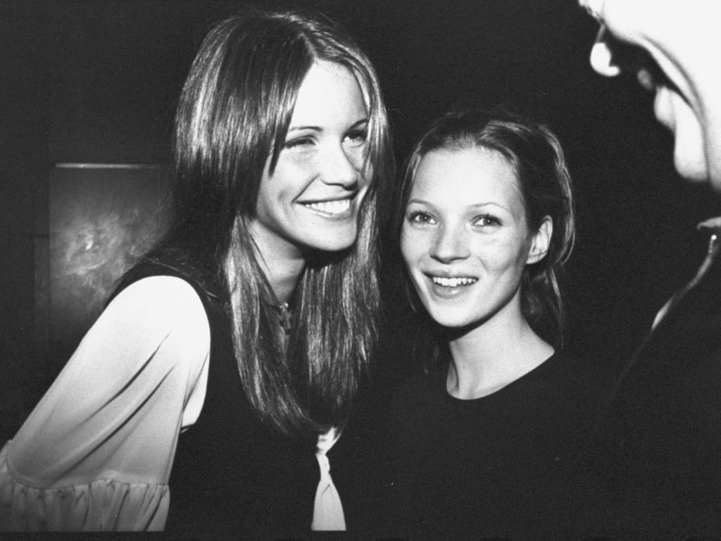 Elle smiles with Kate Moss at the British model’s 19th birthday party. Picture: Robin Platzer/Getty Images