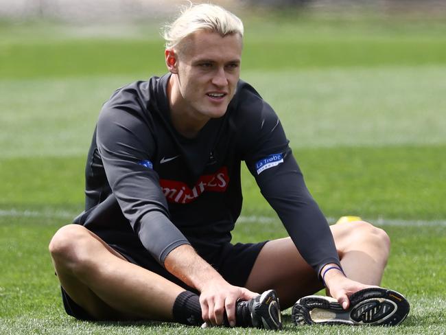 Darcy Moore warms up for Collingwood’s captains run. Picture: Michael Klein