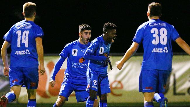 Avondale’s Elvis Kambosa (centre) celebrates scoring against Devonport Strikers in their FFA Cup Round of 16 clash last month. Picture: Getty Images