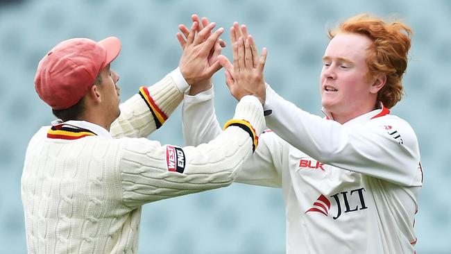 Lloyd Pope of the Redbacks celebrates after taking the wicket of Sean Abbott. Picture: Mark Brake/Getty Images