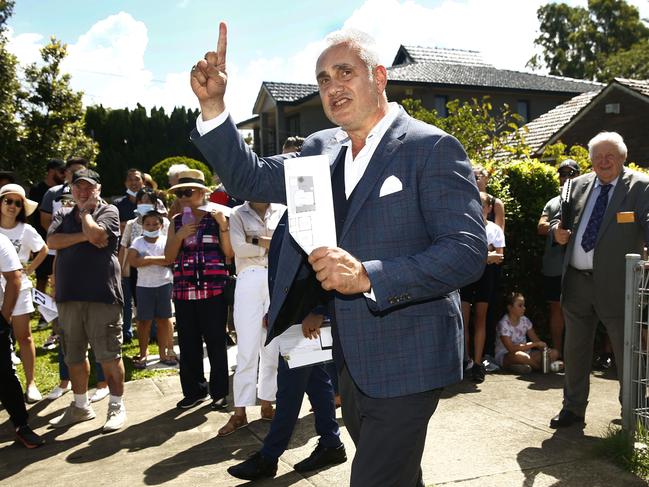 Tom Panos in his role as auctioneer. Picture: John Appleyard