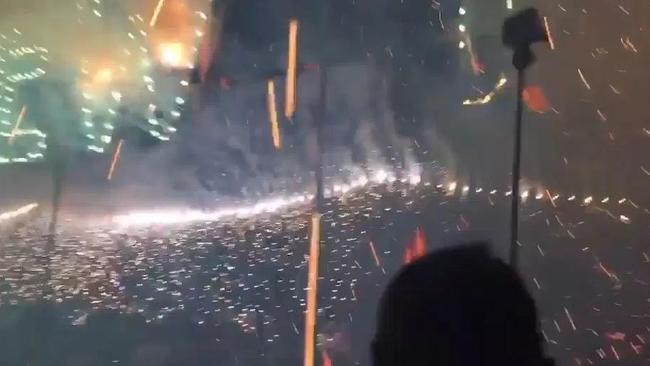 Celebrations turned to panic when a pyrotechnics display went awry during a New Year’s Eve party in Thailand. Picture: Twitter/Lucy Coyle