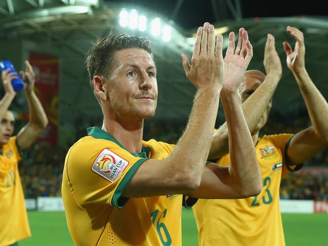 MELBOURNE, AUSTRALIA - JANUARY 09: Nathan Burns of Australia celebrates after Australia defeated Kuwait during the 2015 Asian Cup match between the Australian Socceroos and Kuwait at AAMI Park on January 9, 2015 in Melbourne, Australia. (Photo by Robert Cianflone/Getty Images)