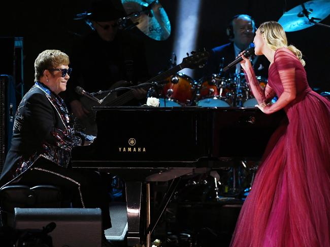 Sir Elton John and Miley Cyrus perform onstage during the 60th Annual GRAMMY Awards at Madison Square Garden on January 28, 2018 in New York City. Picture: Getty