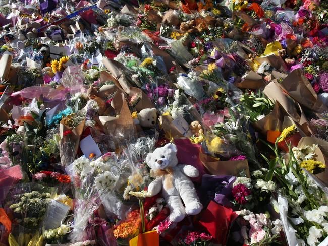 A flower memorial in Bourke St to remember those killed and injured. Picture: David Crosling