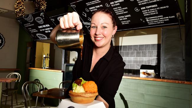 Townsville Pies Manager Hope Turner prepares for the grand opening at Eyre Place North Ward. Picture: Shae Beplate.