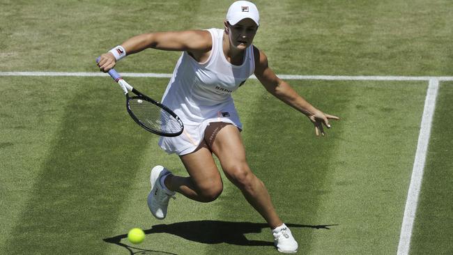 Australia's Ashleigh Barty returns to Belgium's Alison Van Uytvanck in their round two match at Wimbledon. Picture: AP