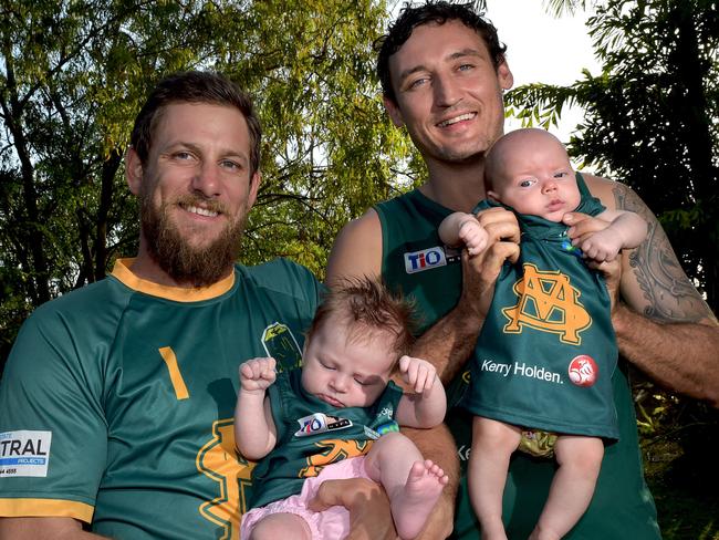 St Mary’s legends and great mates Justin Wilson and Peter MacFarlane with babies Ruby (Wilson) and Mila (MacFarlane). Picture: Katrina Bridgeford