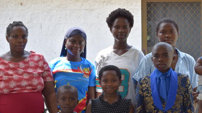 Innocent Muhindo with mother Aline and siblings Neema, 17, Esther, 14, Espe, 12, Nyota, 8, and Moses, 5. Picture: Holly Fishlock