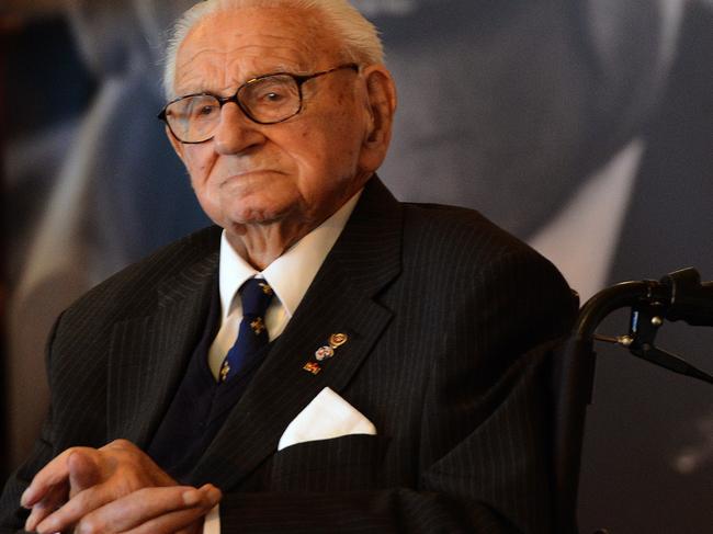 (FILES) A picture taken on October 28, 2014 shows Sir Nicholas Winton receiving the Order of the White Lion at Prague Castle during the celebration of the Independance day. Nicholas Winton, a Briton who saved hundreds of Jewish children in Prague from the Nazis in the run-up to World War II, has died at the age of 106, his family said on July 1, 2015. AFP PHOTO / MICHAL CIZEK