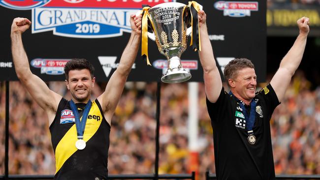 Trent Cotchin and Damien Hardwick celebrate with the premiership cup. Picture: AFL Photos/Getty Images