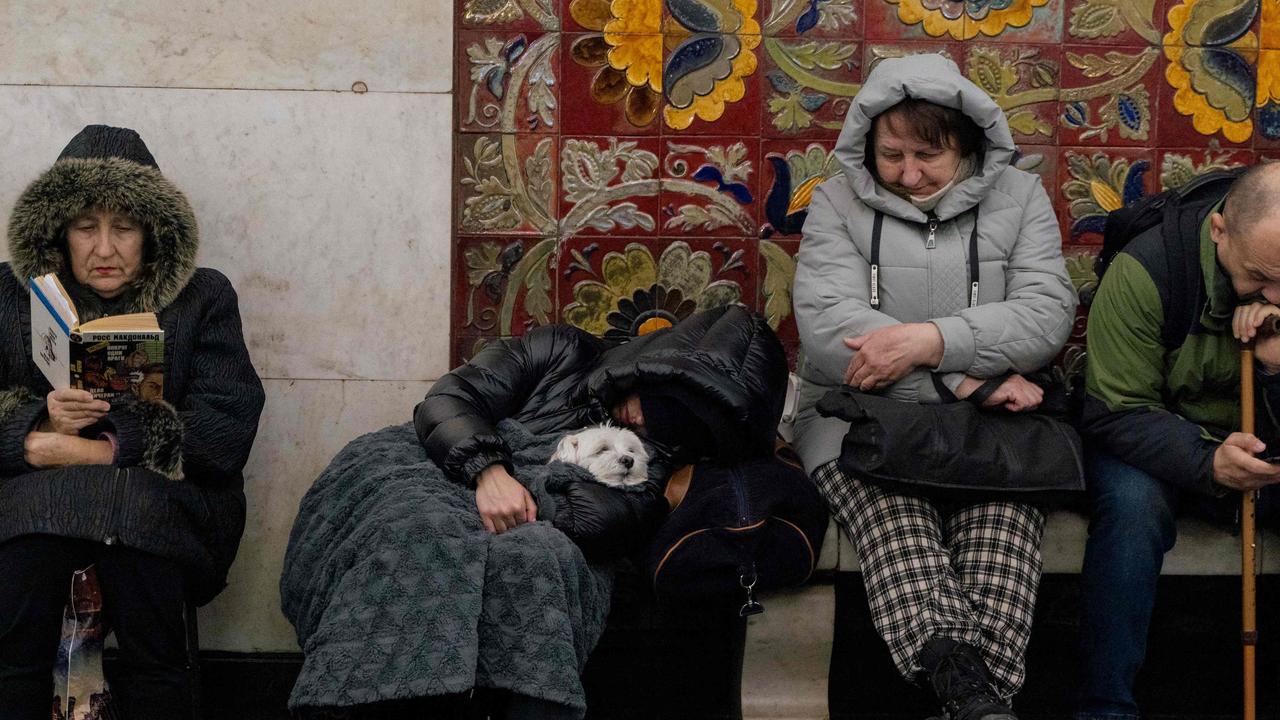 Local residents take shelter in a metro station during an air strike alarm in Kyiv. Picture; AFP