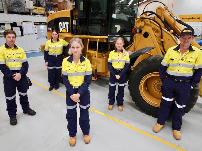 Mackay residents Melanie Rigby (front), Jack Nutting 22 (left), Cate Glendenning 18, Ella Davis 17 and Matt George 22 (right) have been accepted into Hasting Deering's apprenticeship program for 2022 Picture: Hastings Deering