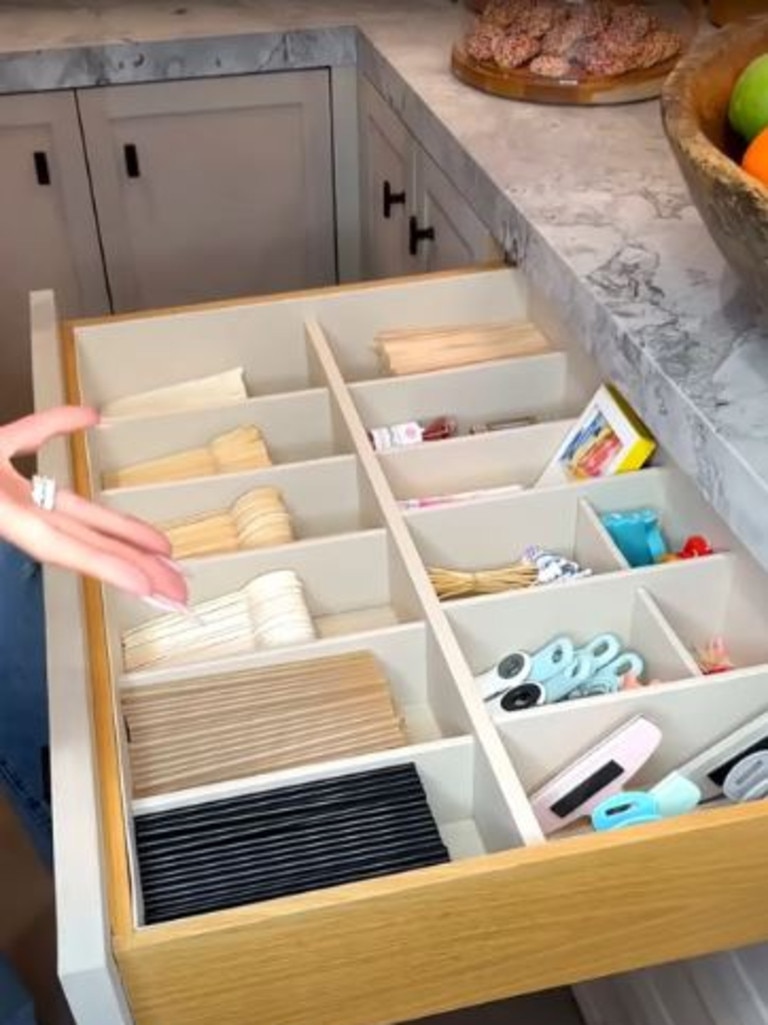 Kardashian uses dividers to organise her cutlery and other items. Picture: Khloé Kardashian/YouTube