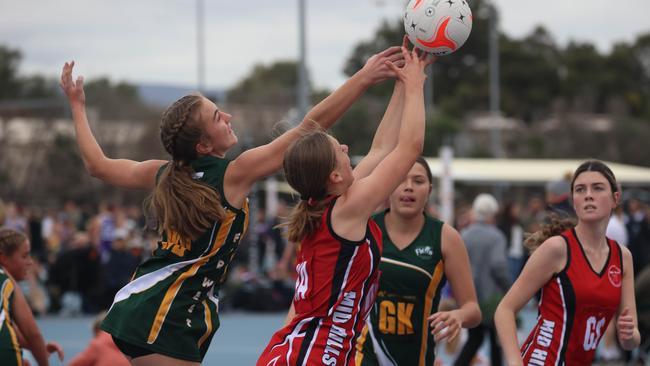 Action from the Mid Hills 1 against Western Eyre under-15 clash at the Netball SA Country Championships. Picture: Russell Millard