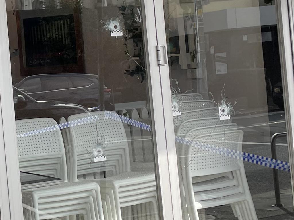 Six bullet holes were fired into the Picket Fence cafe in Ivanhoe East on Sunday morning. Picture: Athos Sirianos