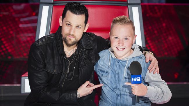 Perth-based The Voice Kids contestant Robbie returned to Sydney to shoot a special behind-the-scenes report on The Voice for Nine News. Pictured with coach Joel Madden. Pic supplied by Nine.