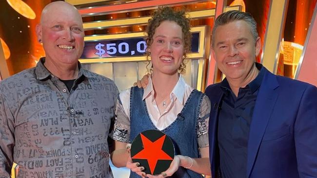 Herne Hill local Arnika Nelson, 21, won $50,000 on Tipping Point. She is pictured here with her dad, Scott, and host Todd Woodbridge.