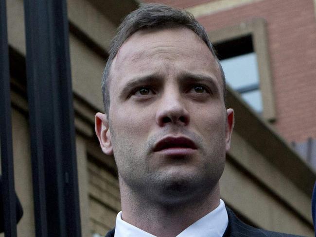 (FILES) In this file photo taken on June 14, 2016 South African Paralympian Oscar Pistorius leaves the Pretoria High Court, on the second day of his pre sentencing hearing set to send him back to jail for murdering his girlfriend three years ago. - South African Paralympic champion Oscar Pistorius might be released from prison this week, a decade after he killed his girlfriend in a crime that gripped the world.  A parole board is to decide whether Pistorius should be let out early, after a hearing in Pretoria on March 31, 2023. (Photo by KAREL PRINSLOO / AFP)