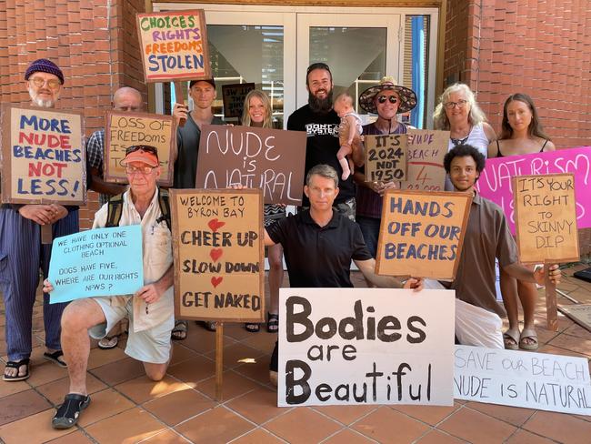 Byron Naturists Inc. members at Byron Shire Council Chambers at Mullumbimby on Thursday. Club president Bradley Benham (front and centre) Picture: Sam Stolz