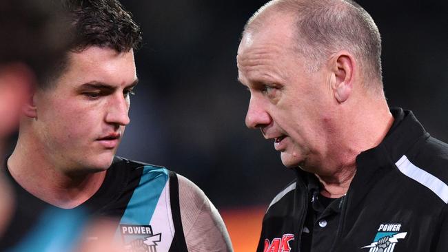 Ken Hinkley the coach of the Power speaks to Tom Rockliff  at 3/4 time during the Round 23 AFL match between the Port Adelaide Power and the Fremantle Dockers at the Adelaide Oval in Adelaide, Sunday, August 25, 2019.  (AAP Image/David Mariuz) NO ARCHIVING, EDITORIAL USE ONLY