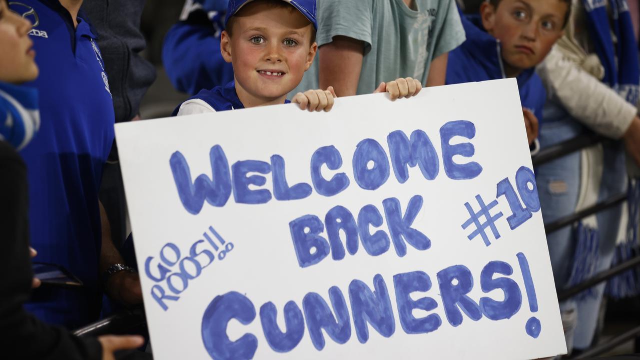 A young fan holds a sign for Ben Cunnington (Photo by Daniel Pockett/Getty Images)