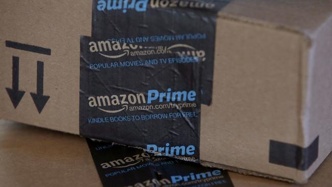 This June 4, 2014 photo shows Amazon.com boxes in Phoenix. Amazon reports quarterly financial results on Thursday, July 24, 2014. (AP Photo/Ross D. Franklin)