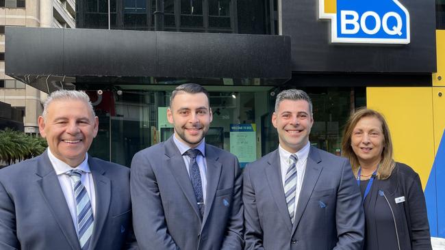 Bank of Queensland owner manager Pino Galimi (second from right) with his dad William, brother Michael and mother-in-law Tina Tantis, who also work in the bank. Pic: PAULA THOMPSON