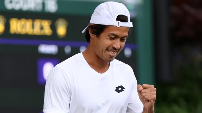 Jason Kubler celebrates winning match point and going through to the round of 32. Picture: Getty Images