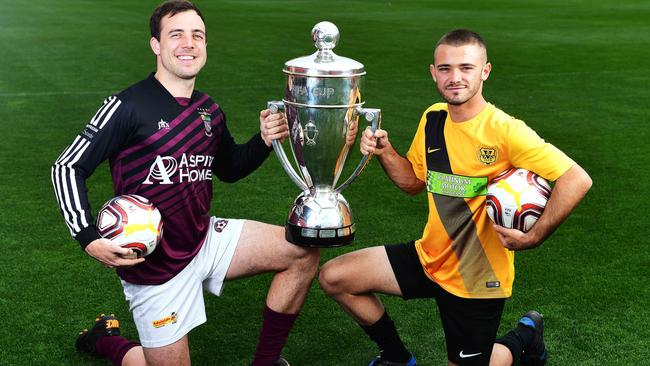 Elizabeth Downs forward Matt Watson (left), pictured with Elizabeth Vale’s James Greaves, will face top flight MetroStars in the FFA Cup SA. Picture: Mark Brake