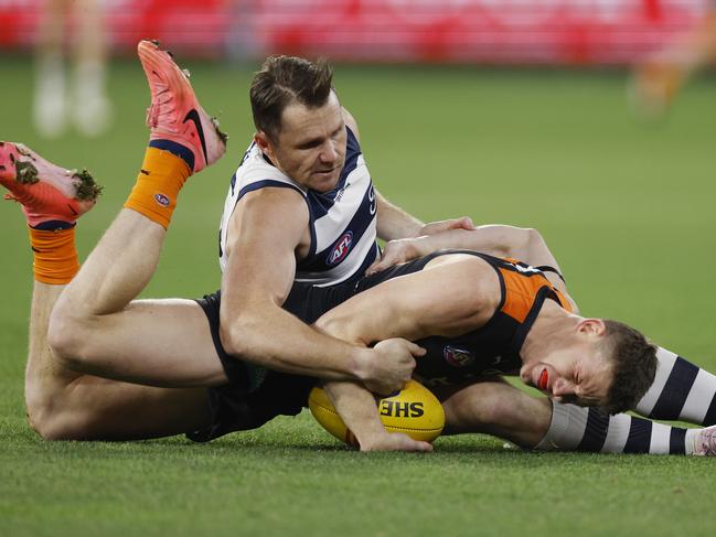 Patrick Dangerfield tackles Carlton’s Sam Walsh last Friday. Picture: Michael Klein