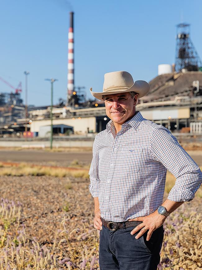 Robbie Katter, outside the Mount Isa Mines operations, says the region needs to be connected to the National Electricity Market.