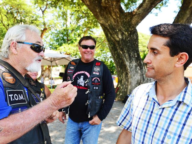 The 2015 State,Townsville.  Mundingburra MP David Crisafulli is confronted by members of the Freedom Riders Association Queensland whilst handing out how to vote cards at Mundingburra State School.  David Crisafulli talks with Mark Webb.   Picture: Zak Simmonds