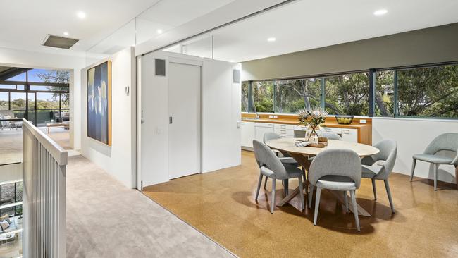 A timber kitchen and dining area on the first floor.