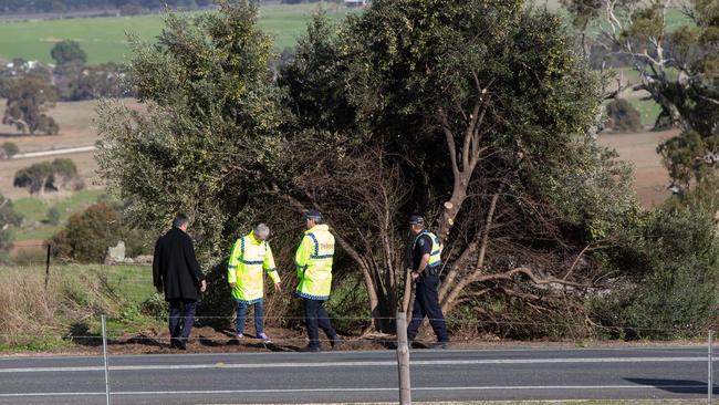 Police investigate the site at which bones were found along Paris Creek Road, Strathalbyn. Picture: Brett Hartwig