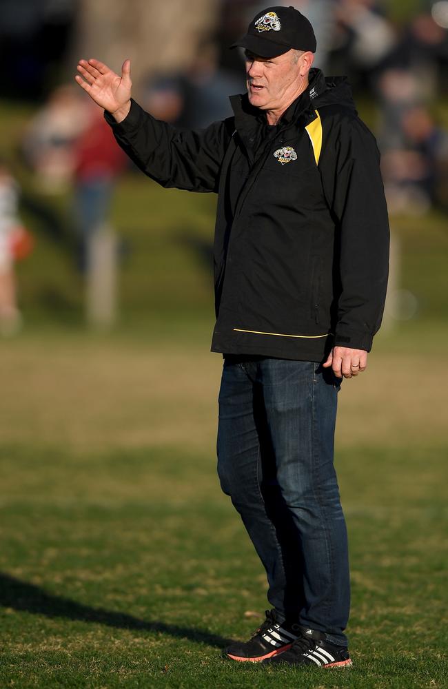 Rodney Eade directing traffic on the Balwyn bench.