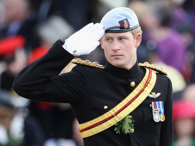 Prince Harry salutes Chelsea Pensioners as he attends the Founder's Day Parade in 2011. Picture: Getty Images.