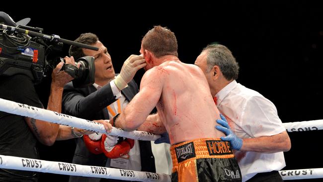 BRISBANE, AUSTRALIA - DECEMBER 18: Jeff Horn is ordered to see the doctor in the ninth round to check a cut above his eye during the middleweight bout between Jeff Horn and Michael Zerafa at Brisbane Convention &amp; Exhibition Centre on December 18, 2019 in Brisbane, Australia. (Photo by Bradley Kanaris/Getty Images)