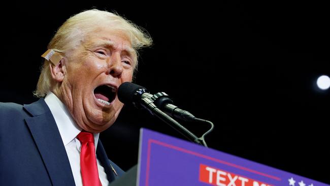 Republican presidential nominee, former US President Donald Trump speaks during a campaign rally at the Van Andel Arena.