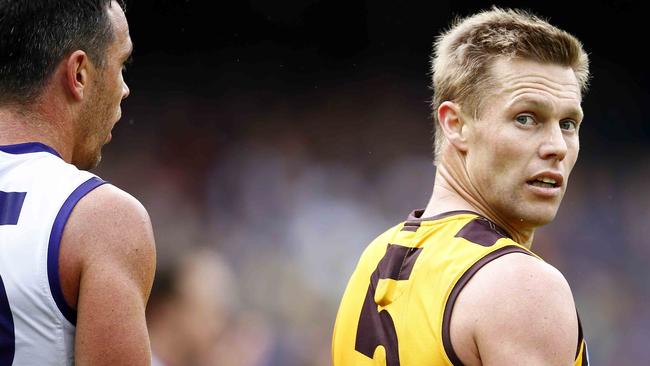 Fremantle stopper Ryan Crowley shadows Sam Mitchell in the 2013 Grand Final. Picture: Michael Klein