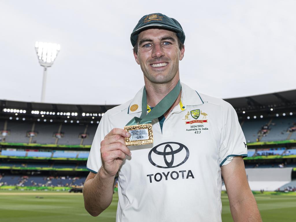 Pat Cummins of Australia poses for a photograph with the Mullagh Medal after being named player of the match during day five of the Men's Fourth Test Match in the series between Australia and India at Melbourne Cricket Ground. Picture: Getty Images