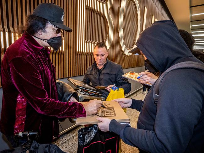 Gene Simmons signs autographs for fans upon arrival at Melbourne Airport to begin the Australian leg of the End of the Road Tour. Picture: Jake Nowakowski