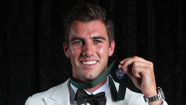 Pat Cummins poses with the Allan Border Medal on Monday night