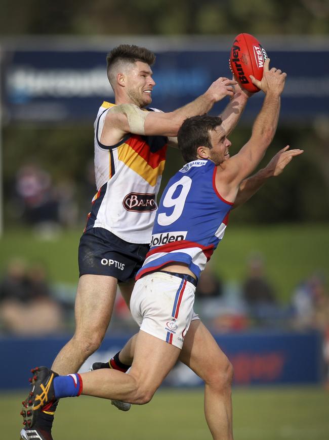 Jydon Neagle, front, playing for Central District in 2019. Picture: AAP Image/Dean Martin