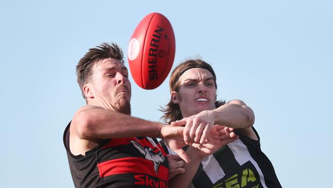 Haydn Smith (Lauderdale) and Liam Roach (Glenorchy) do battle in the ruck. Picture: Nikki Davis-Jones