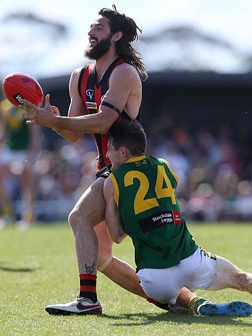 Gippsland Football League Grand Final match between Maffra Eagles and Leongatha Parrots. Maffra became the 2016 premiers, defeating Leongatha 13.10 (88) to 9. 16 (67). Daniel Bedggood is under tight pressure with a tackle by Brenton Fitzgerald. Picture: Yuri Kouzmin