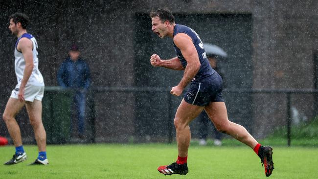 Jackson Paine celebrates his goal for Old Melburnians. Picture: George Sal