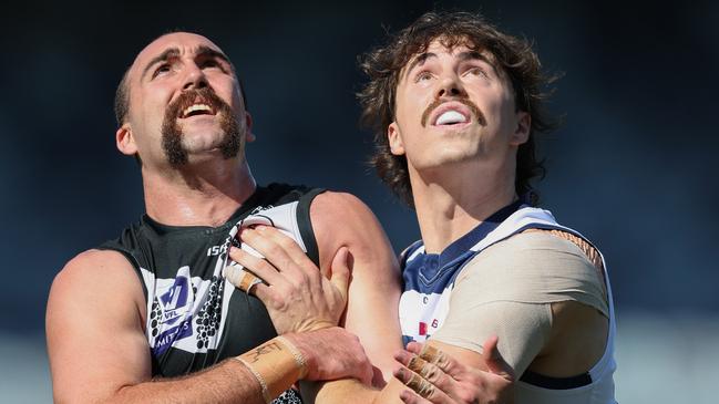 GEELONG, AUSTRALIA - SEPTEMBER 07: Brayden Crossley of the Sharks and Joe Furphy of the Cats compete in a ruck contest during the 2024 VFL First Semi Final match between the Geelong Cats and Southport Sharks at GMHBA Stadium on September 07, 2024 in Geelong, Australia. (Photo by Rob Lawson/AFL Photos via Getty Images)