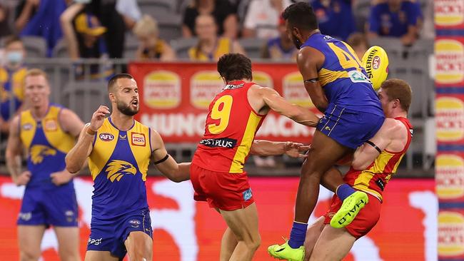 Willie Rioli collides heavily with Matt Rowell in a marking contest on Sunday. Picture: Getty Images